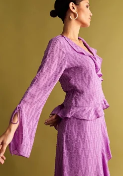 Blusa Plumeti Bajo Asimetrico-Scalpers Clearance