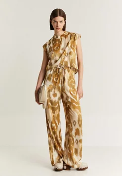 Pantalon Fluido Animal Print-Scalpers Fashion